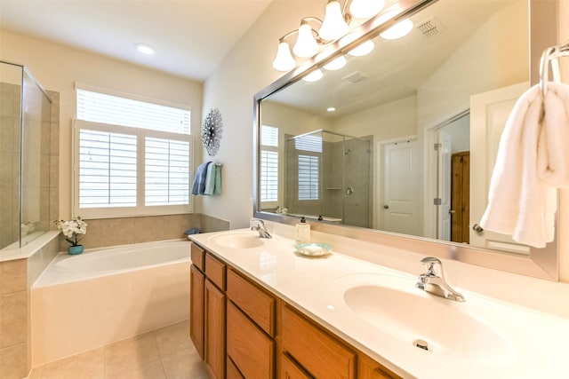 bathroom featuring tile patterned floors, vanity, and independent shower and bath