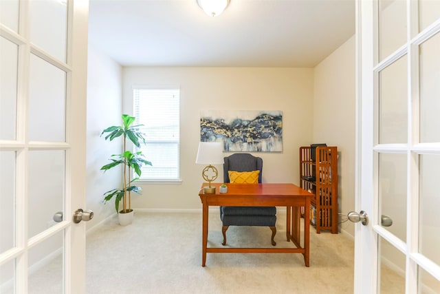 office space featuring light colored carpet and french doors