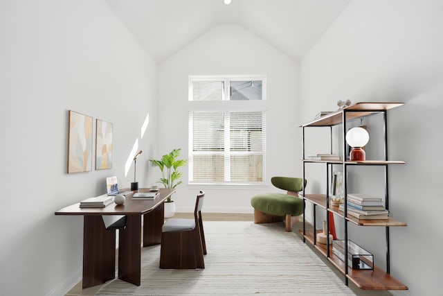 office space with lofted ceiling