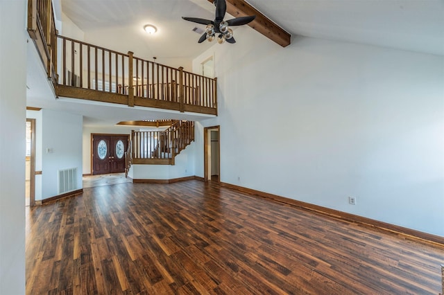 unfurnished living room featuring ceiling fan, dark wood-type flooring, high vaulted ceiling, and beam ceiling