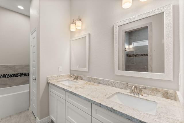 bathroom with vanity and separate shower and tub