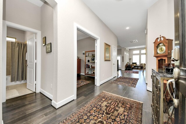 foyer entrance with dark wood-type flooring