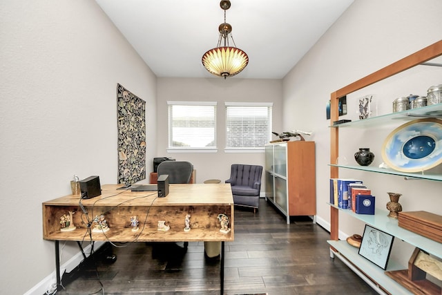 office space with dark wood-type flooring