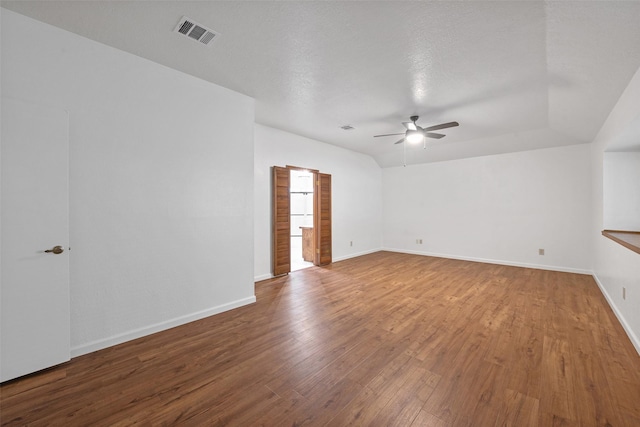 spare room featuring a textured ceiling, ceiling fan, and hardwood / wood-style flooring