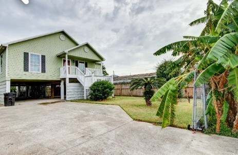 view of front of home with a carport and a porch