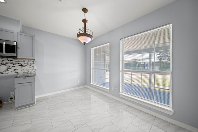 view of unfurnished dining area