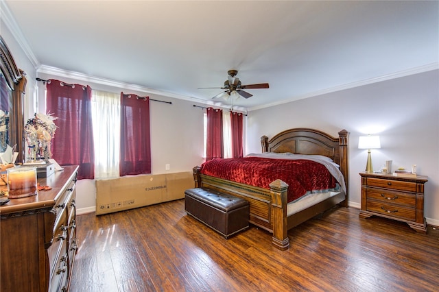 bedroom with ceiling fan, dark hardwood / wood-style floors, and ornamental molding