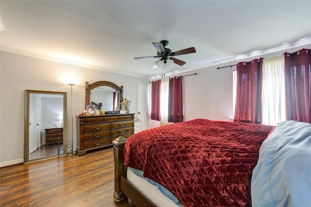 bedroom with ceiling fan, multiple windows, dark hardwood / wood-style floors, and crown molding