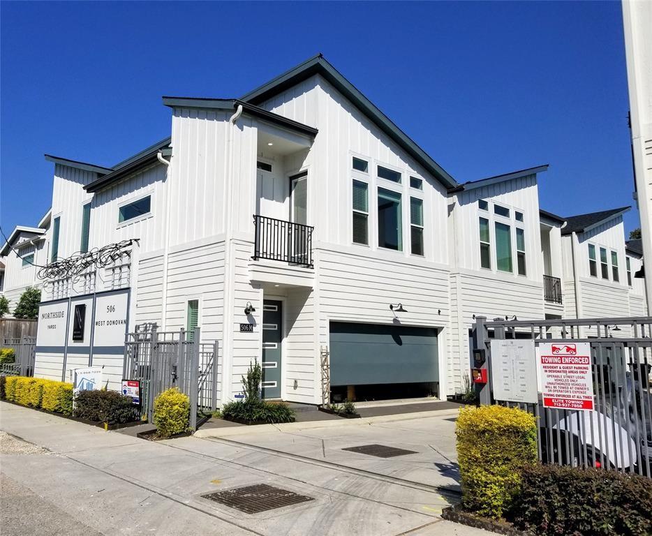 506 W Donovan St Unit M, Houston, TX 77091 - view of property featuring a garage