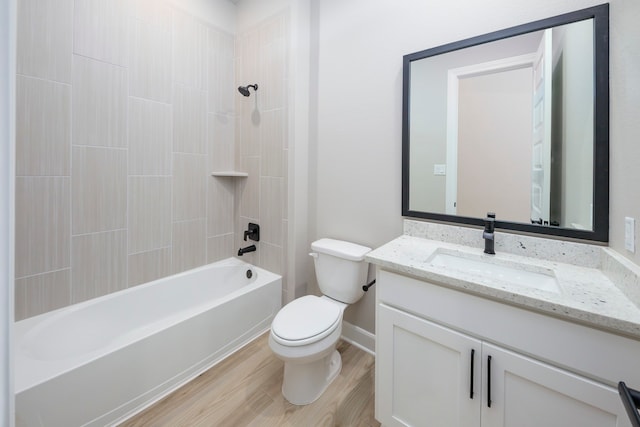 full bathroom with toilet, wood-type flooring, shower / washtub combination, and vanity