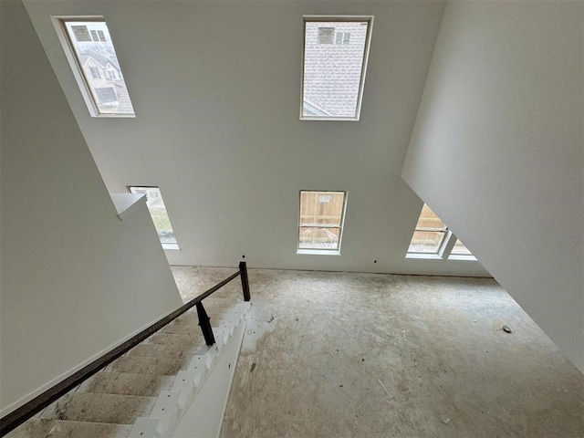 interior space with plenty of natural light and a skylight