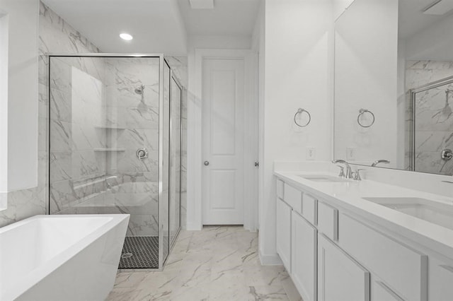 7462 Cattail Falls Ln, Porter, TX 77365 - full bath featuring marble look tile flooring, a marble finish shower, a freestanding tub, recessed lighting, and double vanity