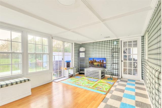 unfurnished sunroom with coffered ceiling