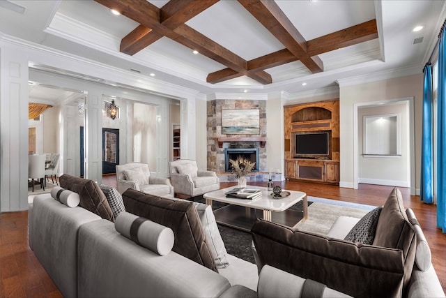 living room featuring wood finished floors, beamed ceiling, a fireplace, and coffered ceiling