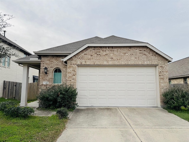 ranch-style house featuring a garage