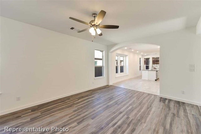 interior space featuring ceiling fan and light hardwood / wood-style flooring