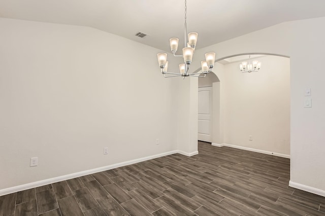 7535 Cypress Pin Oak Dr, Cypress, TX 77433 - unfurnished room with vaulted ceiling, a chandelier, visible vents, arched walkways, and dark wood-style flooring
