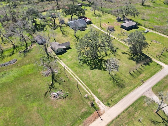 birds eye view of property featuring a rural view