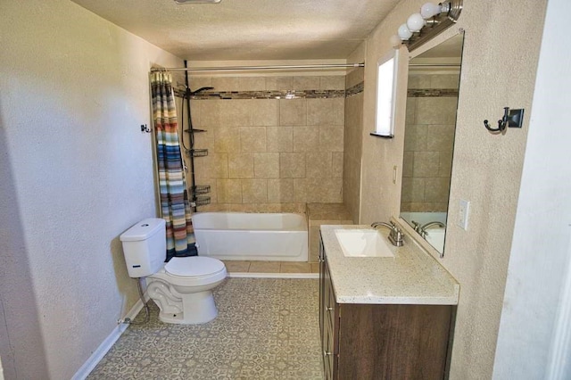 bathroom featuring baseboards, toilet, vanity, a textured ceiling, and shower / bath combination with curtain