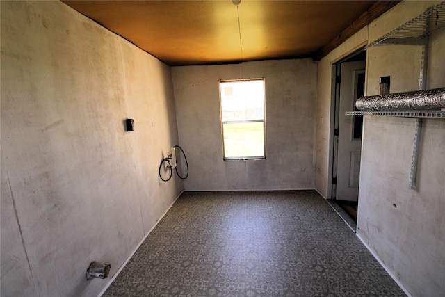 unfurnished room featuring tile patterned floors