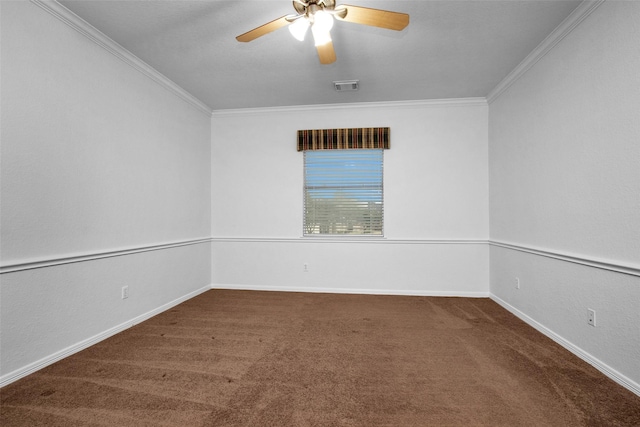 spare room featuring ceiling fan, ornamental molding, and carpet flooring