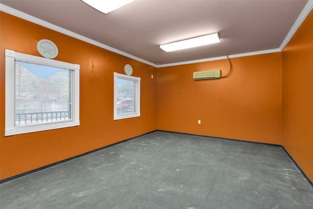 spare room featuring crown molding and a wall unit AC