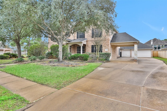 view of front facade with a front yard and a garage