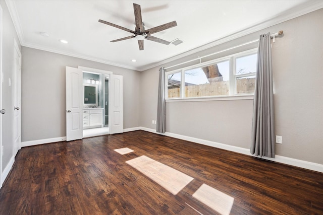 unfurnished room featuring ceiling fan, dark hardwood / wood-style flooring, and crown molding