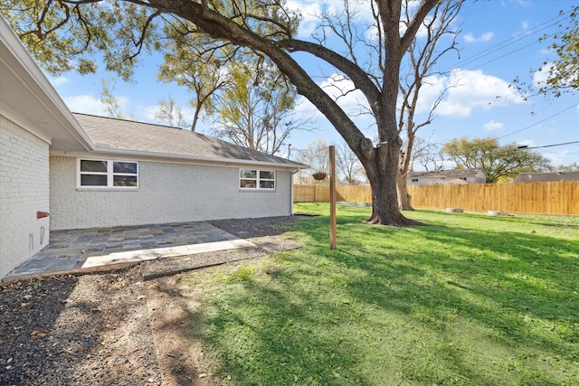 view of yard with a patio area