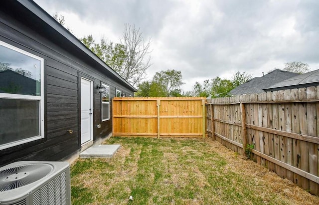 view of yard featuring central AC