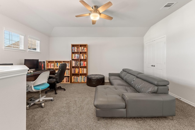 office with carpet, ceiling fan, and vaulted ceiling