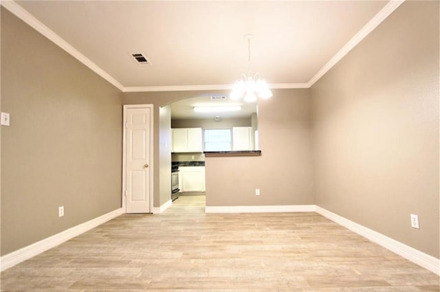 unfurnished dining area featuring light wood-type flooring, an inviting chandelier, and crown molding