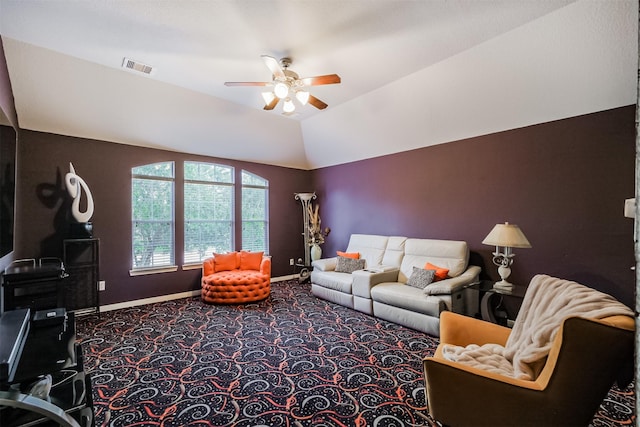 carpeted living room featuring ceiling fan and lofted ceiling