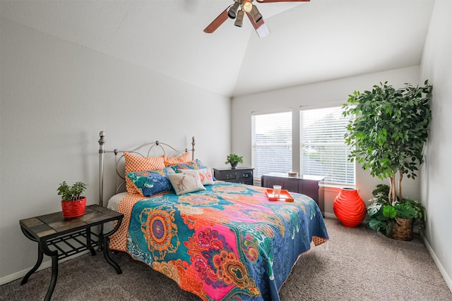 carpeted bedroom with ceiling fan and vaulted ceiling