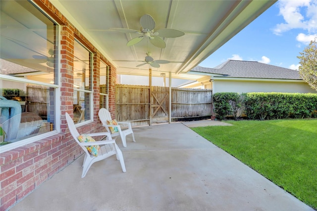 view of patio / terrace featuring ceiling fan