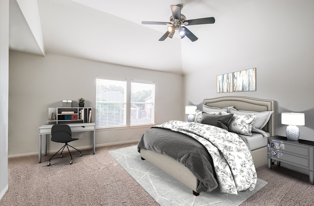 carpeted bedroom with ceiling fan and lofted ceiling