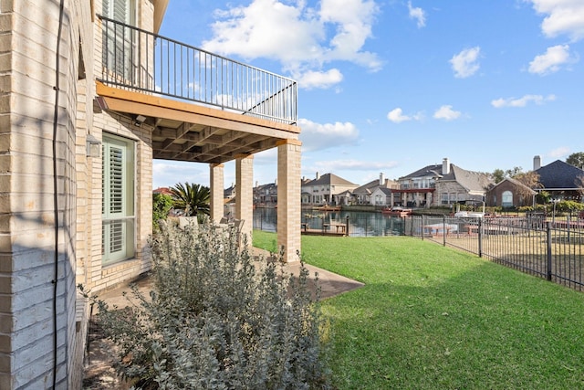 view of yard with a water view