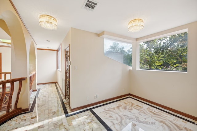 interior space with an inviting chandelier