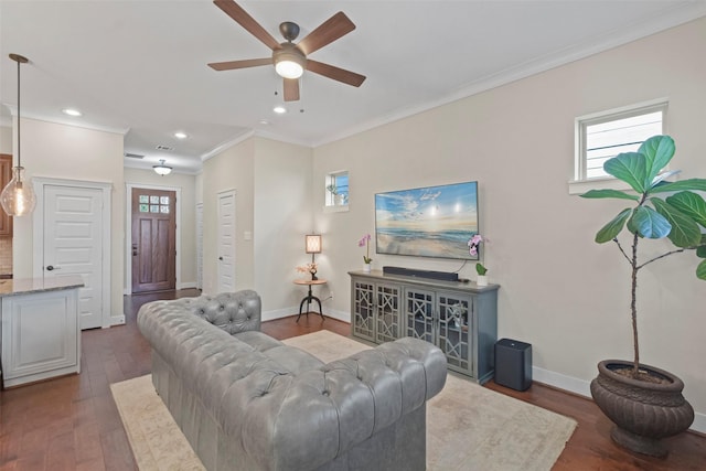 living room featuring ornamental molding, ceiling fan, and dark hardwood / wood-style flooring