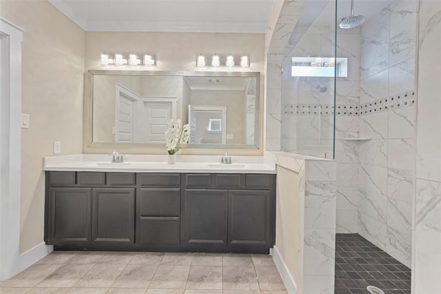 bathroom with crown molding, tiled shower, and vanity