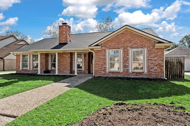 view of front of house with a front lawn