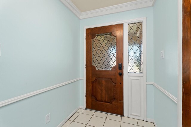 tiled entrance foyer with crown molding