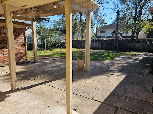 view of patio / terrace featuring ceiling fan