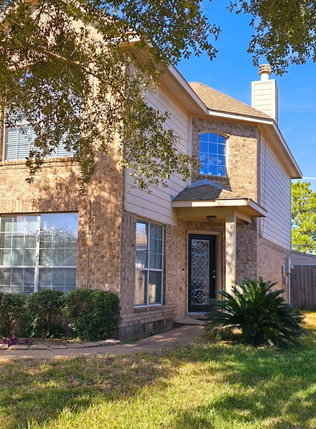 view of front of house with a front yard