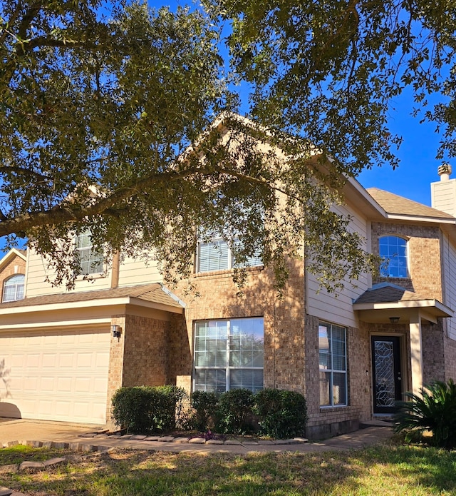 view of front of property with a garage