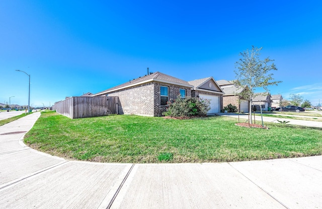 view of property exterior featuring a lawn and a garage