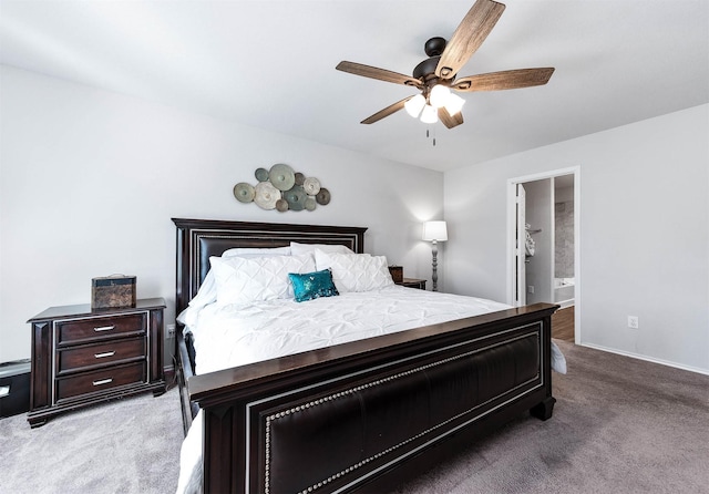 carpeted bedroom with ceiling fan and connected bathroom