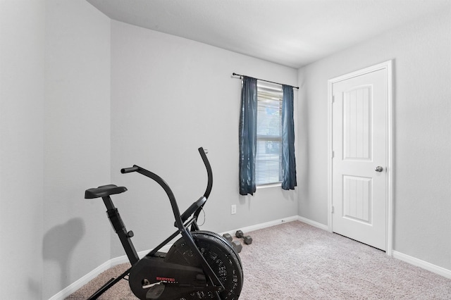 workout area with light colored carpet