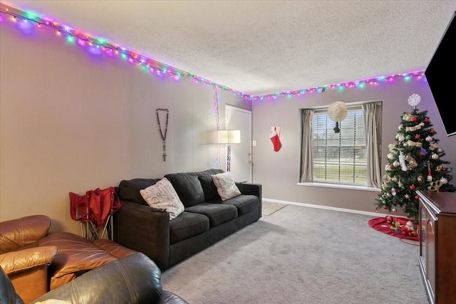 carpeted living room featuring a textured ceiling