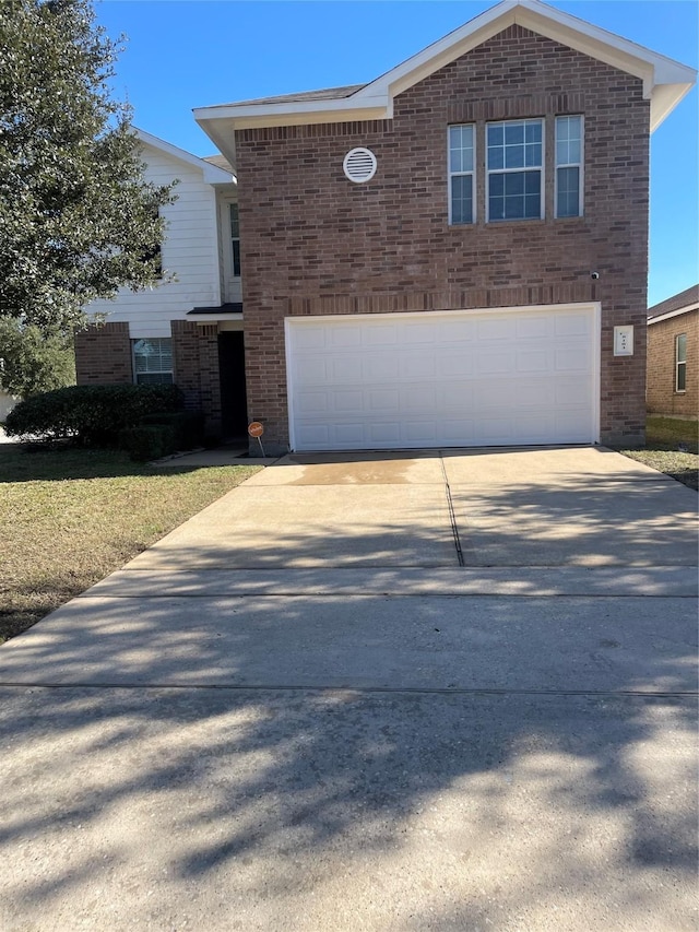 view of property with a garage